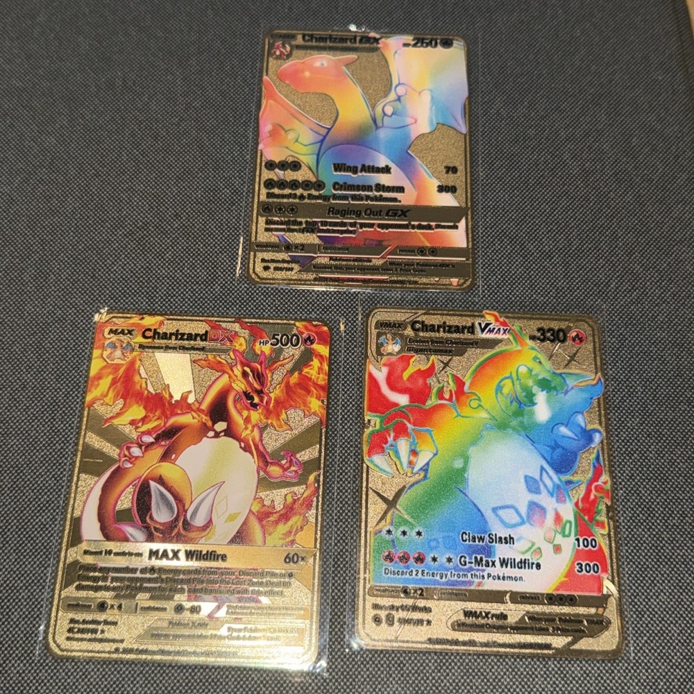 Pokemon  Gold Metal Charizard Cards (3)